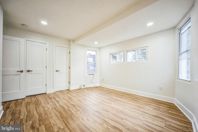 unfurnished bedroom featuring light hardwood / wood-style floors