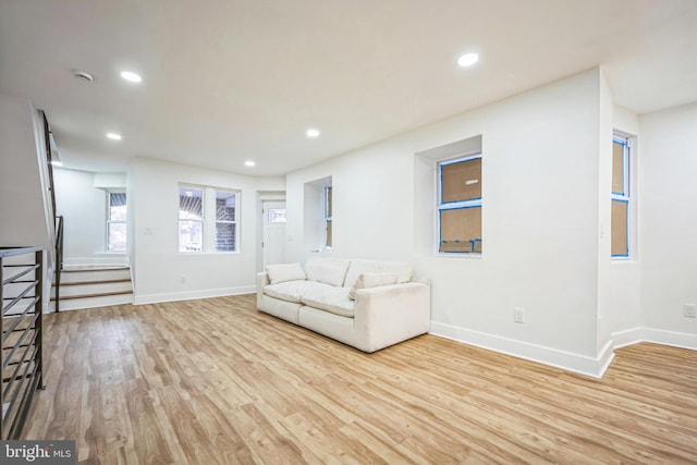 unfurnished living room featuring light hardwood / wood-style floors