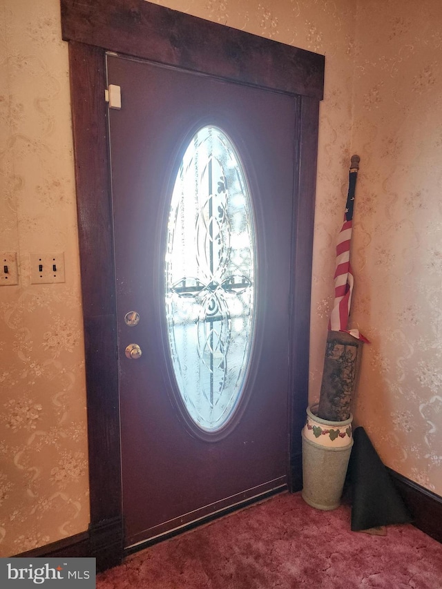 entryway with carpet