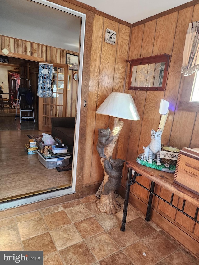 interior space featuring wooden walls