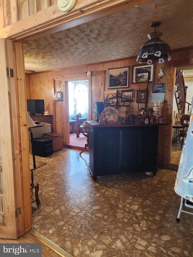 office space with wood walls