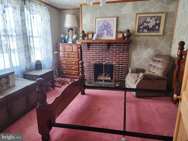 living room with carpet, crown molding, and a brick fireplace