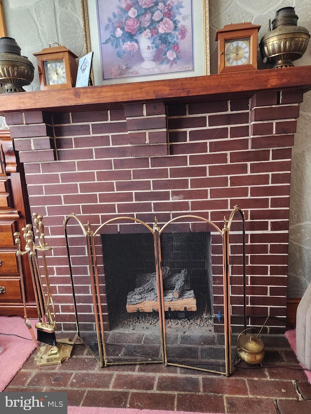 interior details with a fireplace