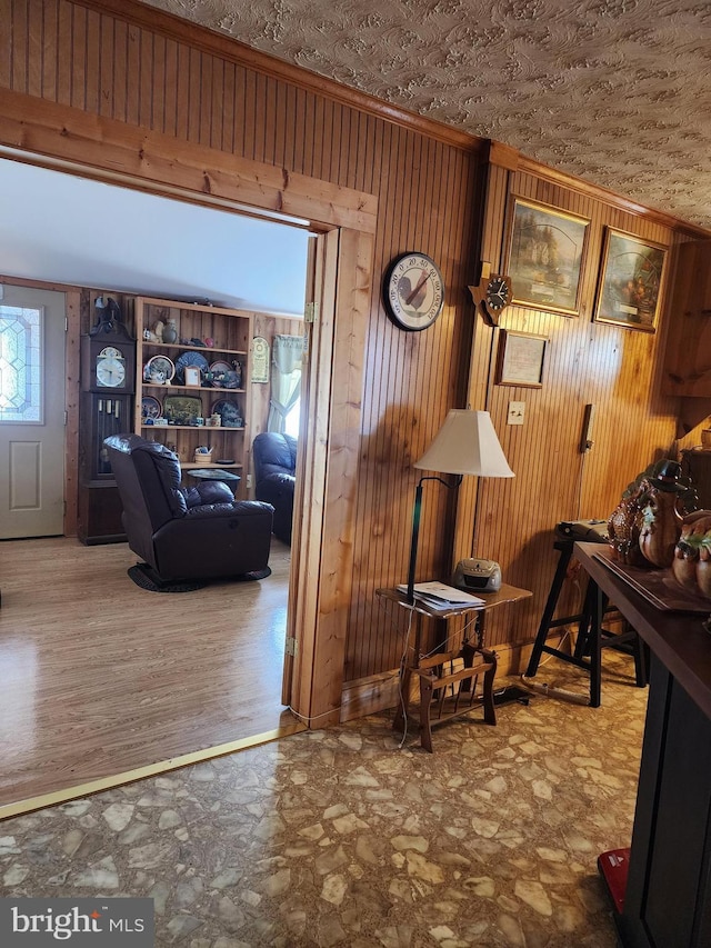 interior space featuring wood walls