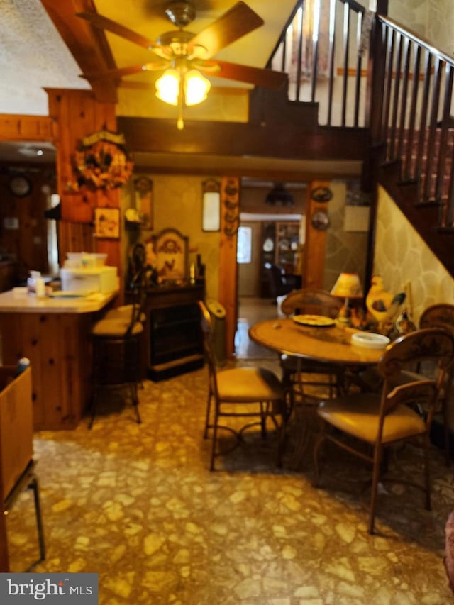 dining space featuring ceiling fan