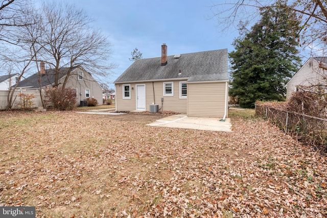 rear view of house featuring a patio and central AC unit