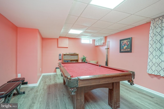 rec room featuring light wood-type flooring, a drop ceiling, and pool table