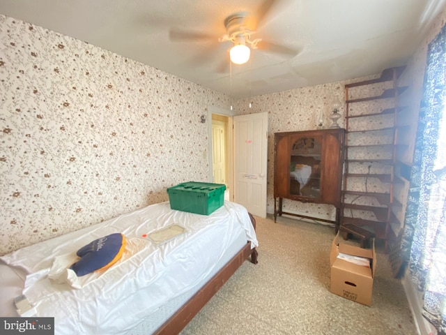 bedroom featuring ceiling fan