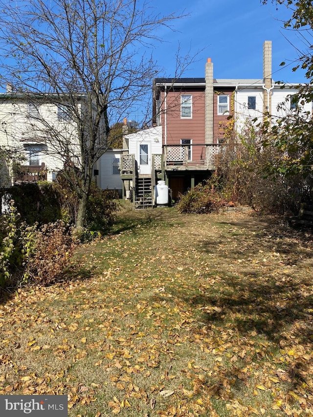 view of yard with a wooden deck