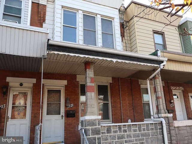 doorway to property featuring a porch