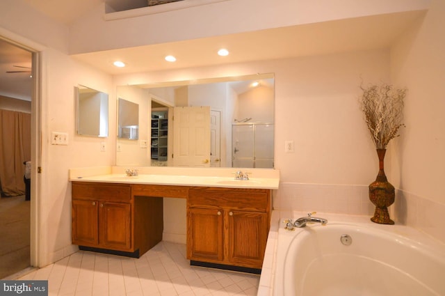 bathroom with vanity, tile patterned floors, and independent shower and bath