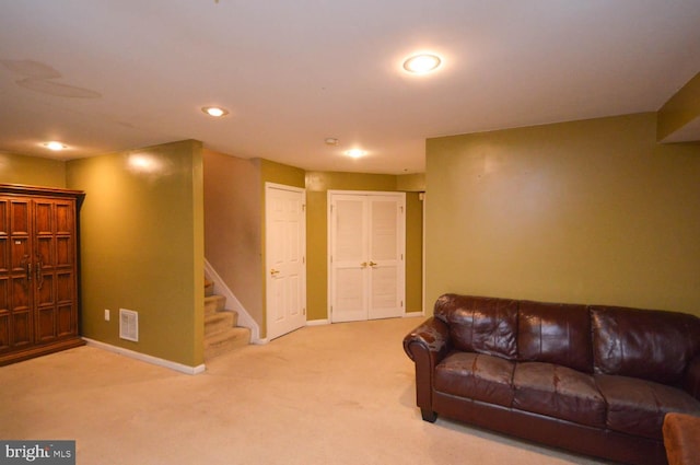 living room with light colored carpet