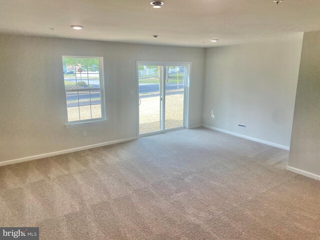 view of carpeted spare room