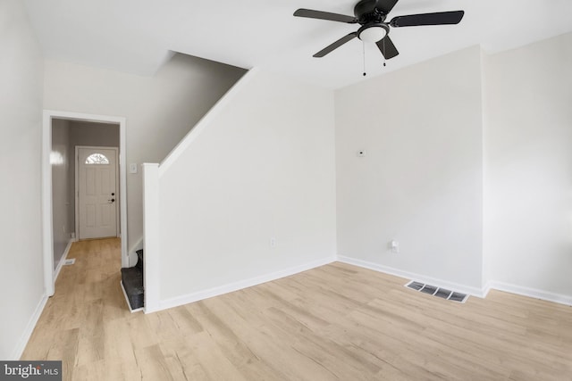 interior space with ceiling fan and light wood-type flooring