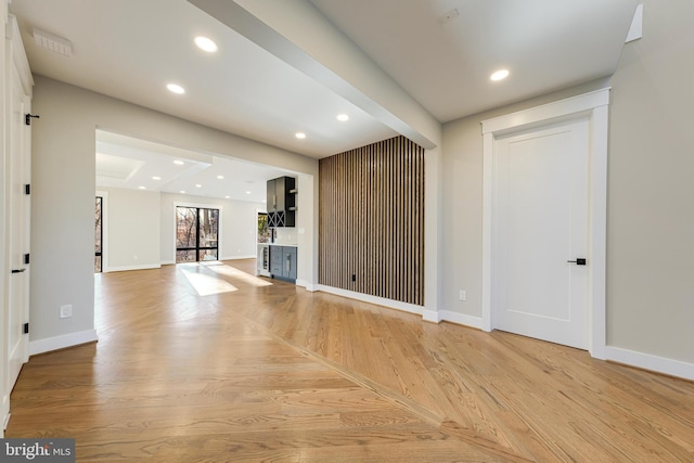 unfurnished living room with light hardwood / wood-style floors