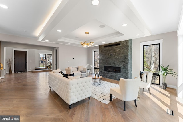 3113 Circle Hill Rd, Alexandria, VA 22305 - living area featuring healthy amount of natural light, a tray ceiling, a fireplace, and recessed lighting