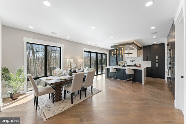 3113 Circle Hill Rd, Alexandria, VA 22305 - dining area with recessed lighting and light wood-style flooring