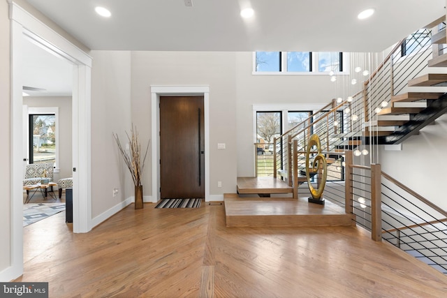 3113 Circle Hill Rd, Alexandria, VA 22305 - entryway featuring wood finished floors, recessed lighting, baseboards, and stairway