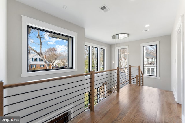 3113 Circle Hill Rd, Alexandria, VA 22305 - corridor with healthy amount of natural light, an upstairs landing, wood finished floors, and recessed lighting