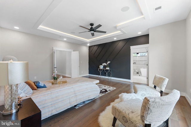 3113 Circle Hill Rd, Alexandria, VA 22305 - bedroom featuring a tray ceiling, wood finished floors, recessed lighting, and baseboards