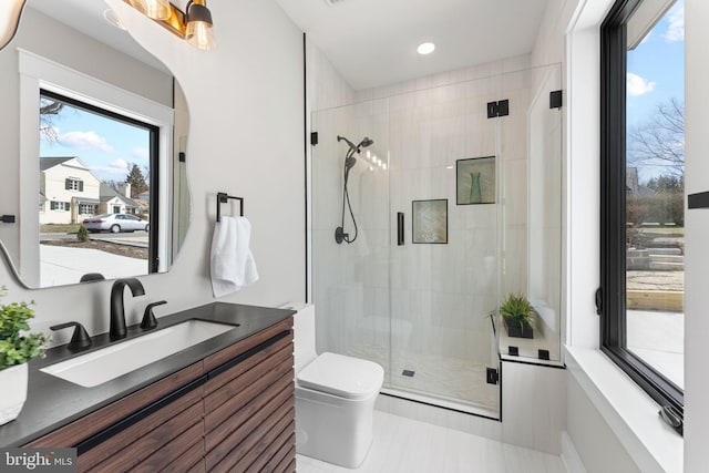 3113 Circle Hill Rd, Alexandria, VA 22305 - full bath featuring healthy amount of natural light, vanity, toilet, a stall shower, and recessed lighting