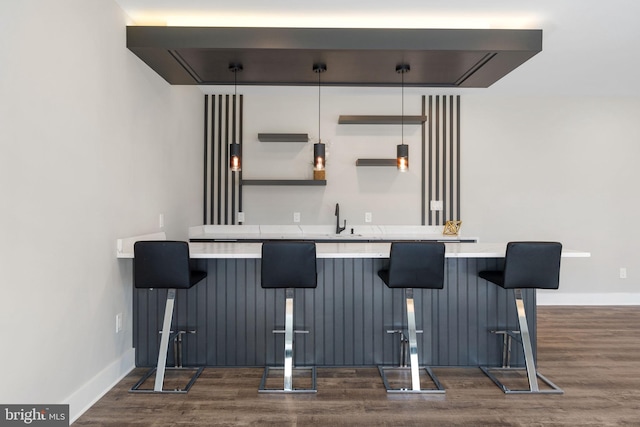 3113 Circle Hill Rd, Alexandria, VA 22305 - indoor wet bar with dark wood finished floors and baseboards