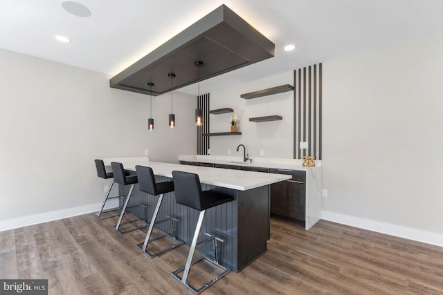 3113 Circle Hill Rd, Alexandria, VA 22305 - indoor wet bar with wood finished floors, baseboards, and recessed lighting
