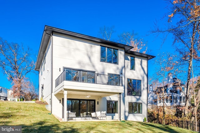 3113 Circle Hill Rd, Alexandria, VA 22305 - back of house with a lawn, ceiling fan, a balcony, and a patio