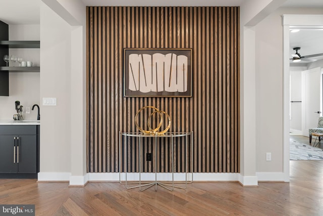 3113 Circle Hill Rd, Alexandria, VA 22305 - detailed view of wood finished floors, baseboards, a sink, and ceiling fan
