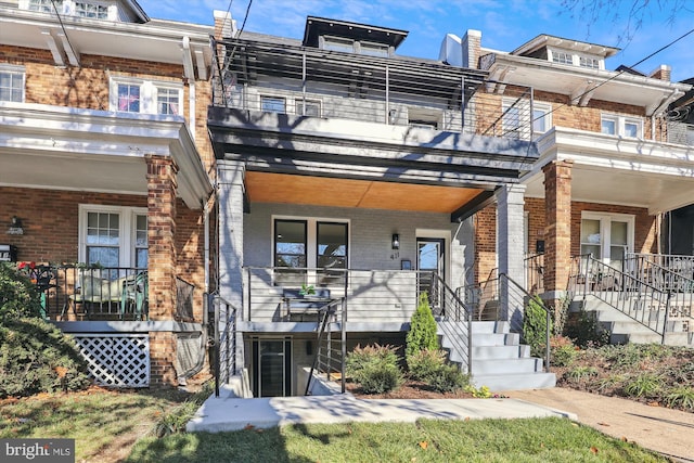 view of property featuring a balcony