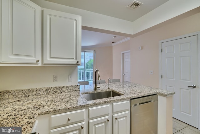 kitchen featuring white cabinets, sink, stainless steel dishwasher, light stone countertops, and light tile patterned flooring