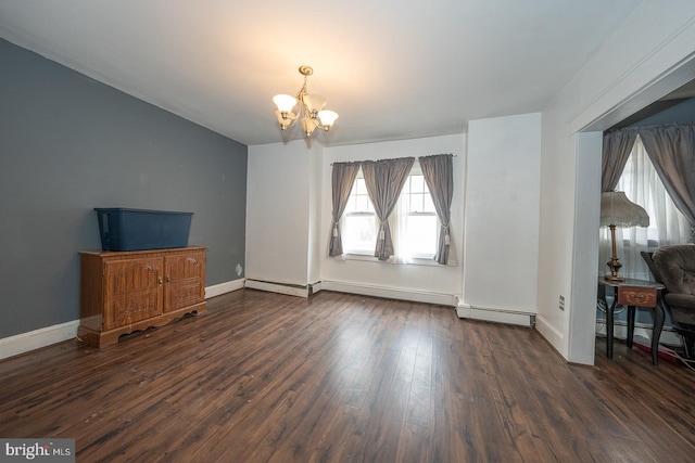 unfurnished living room featuring a baseboard heating unit, dark hardwood / wood-style flooring, and a notable chandelier