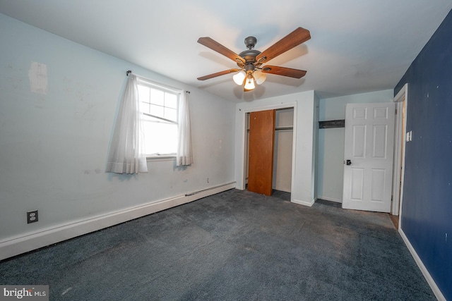 unfurnished bedroom with dark colored carpet, a baseboard radiator, and ceiling fan