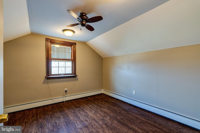 bonus room with dark hardwood / wood-style flooring, baseboard heating, vaulted ceiling, and ceiling fan