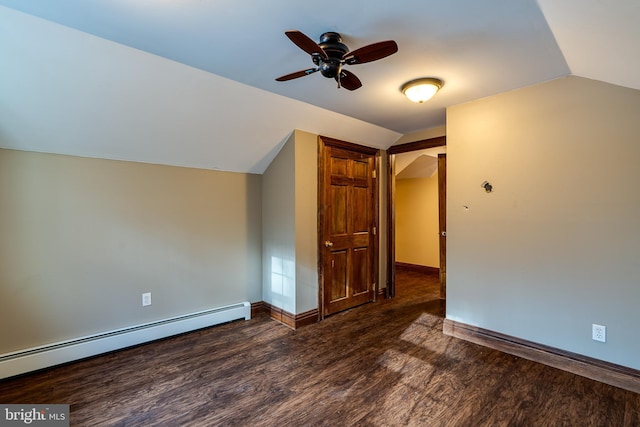 bonus room featuring ceiling fan, vaulted ceiling, dark hardwood / wood-style flooring, and a baseboard radiator