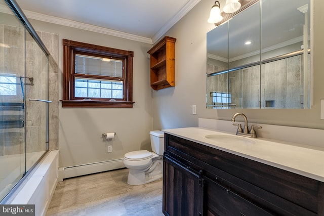 full bathroom with vanity, crown molding, toilet, enclosed tub / shower combo, and baseboard heating