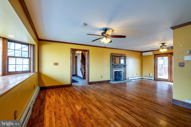 unfurnished living room with wood-type flooring, ceiling fan, and a baseboard heating unit