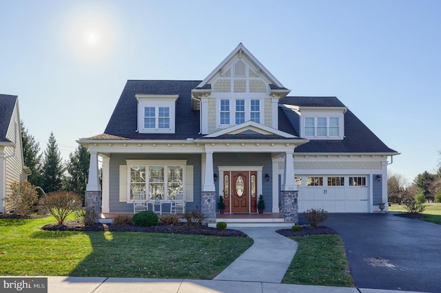 craftsman-style home with a front lawn