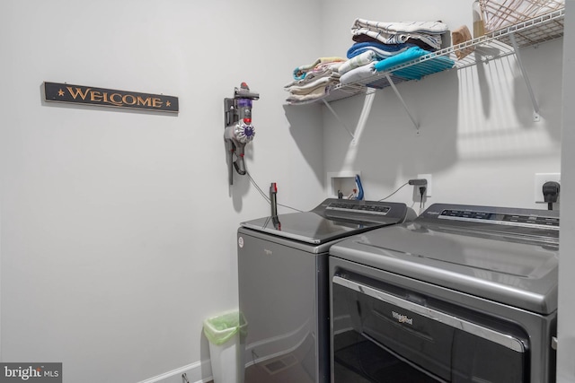 washroom featuring separate washer and dryer