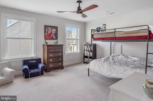 bedroom with light colored carpet and ceiling fan