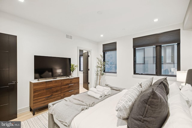 bedroom featuring light hardwood / wood-style flooring