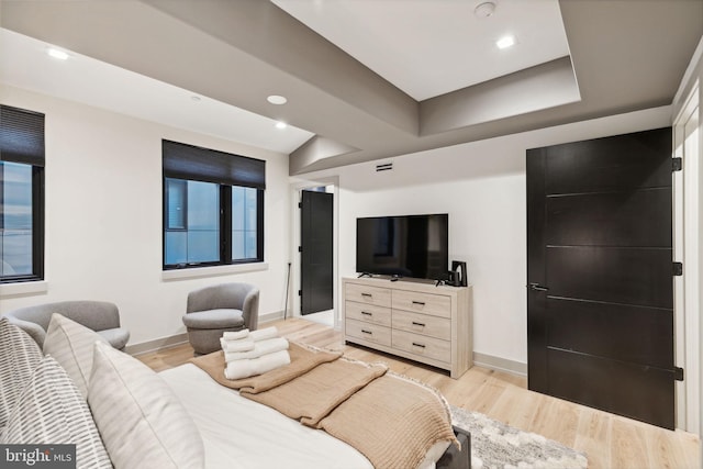 bedroom with light wood-type flooring