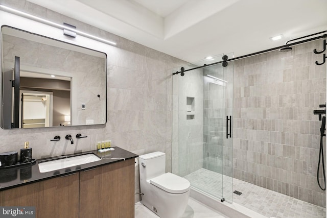 bathroom featuring vanity, backsplash, toilet, tile walls, and walk in shower