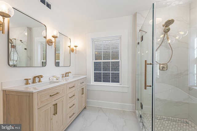 bathroom with vanity and an enclosed shower