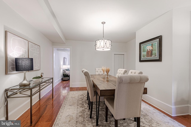 dining room with hardwood / wood-style floors