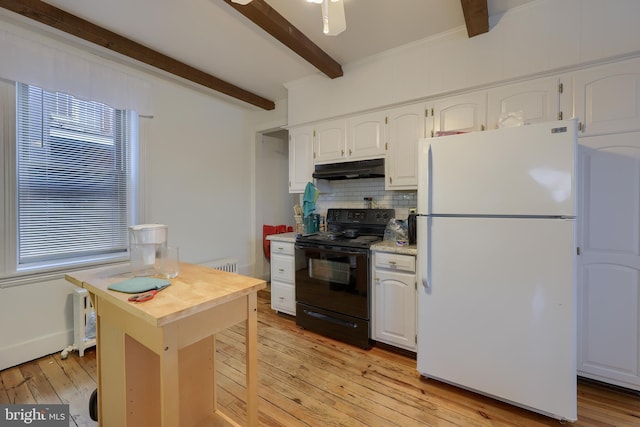 kitchen featuring white cabinetry, beamed ceiling, white fridge, and black range with electric cooktop