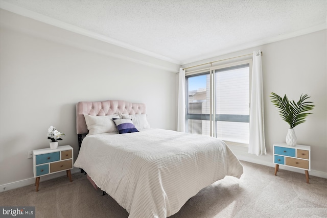 carpeted bedroom with a textured ceiling