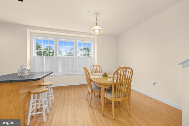 dining area featuring light wood-type flooring