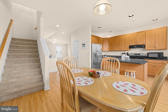 dining space featuring light hardwood / wood-style floors