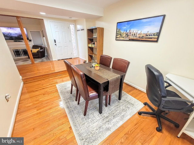 dining room featuring light hardwood / wood-style floors